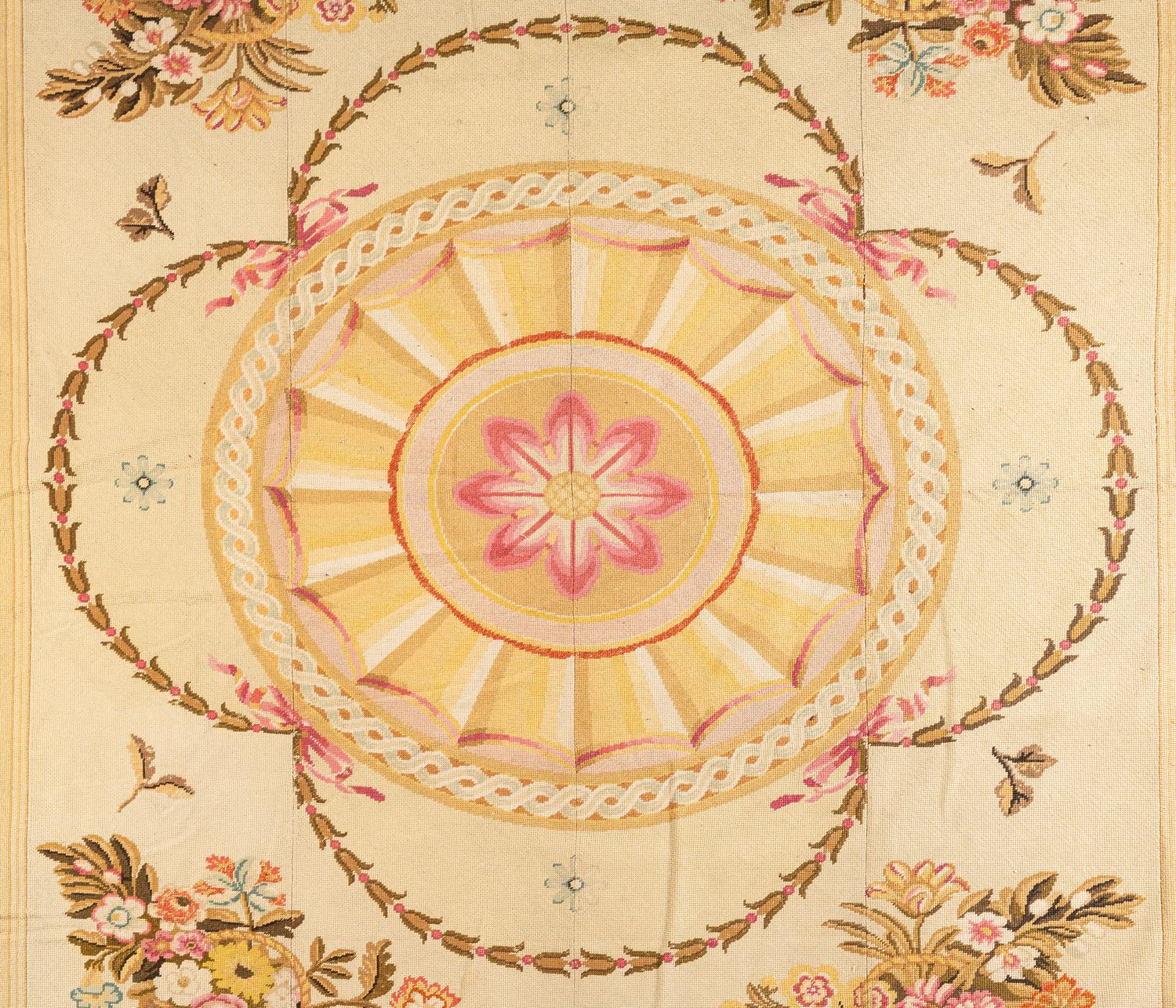 A Large Needlepoint Wool Rug