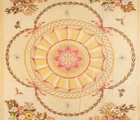 A Large Needlepoint Wool Rug