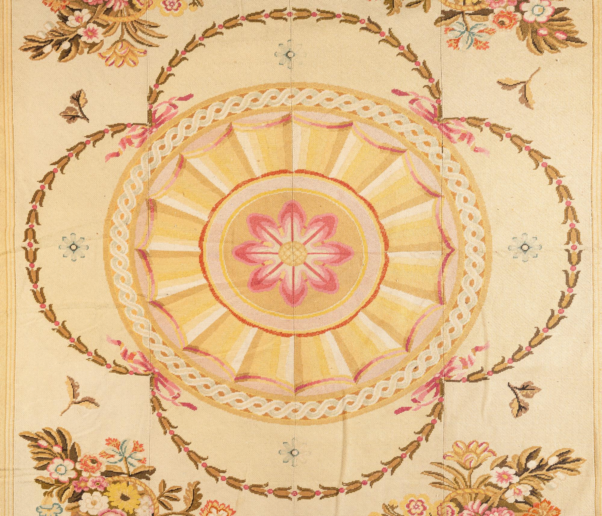 A Large Needlepoint Wool Rug