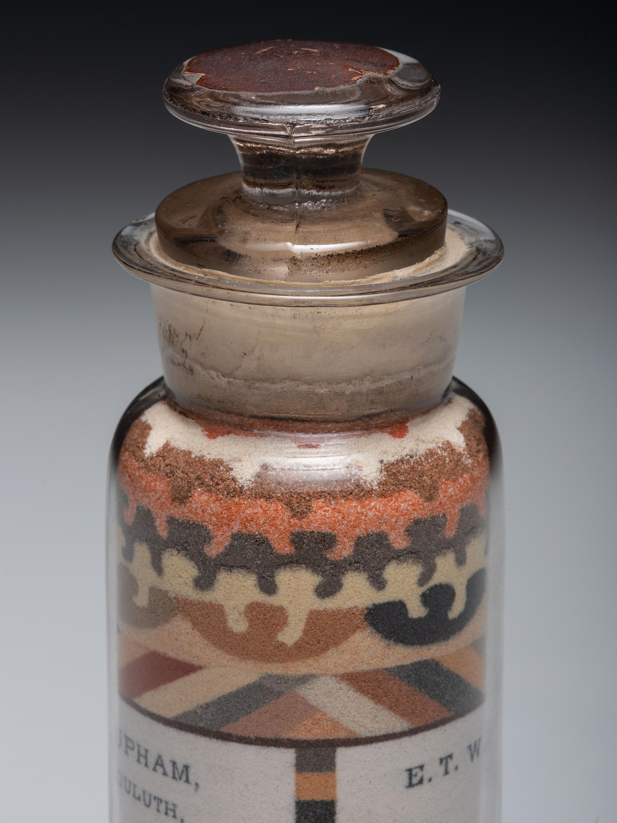 An Andrew Clemens (American, 1857-1894) Williams and Upham Contractors for River and Harbor Improvements Sand Bottle