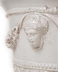 A White Glazed Pottery Jardinière and a Brass Jardinière