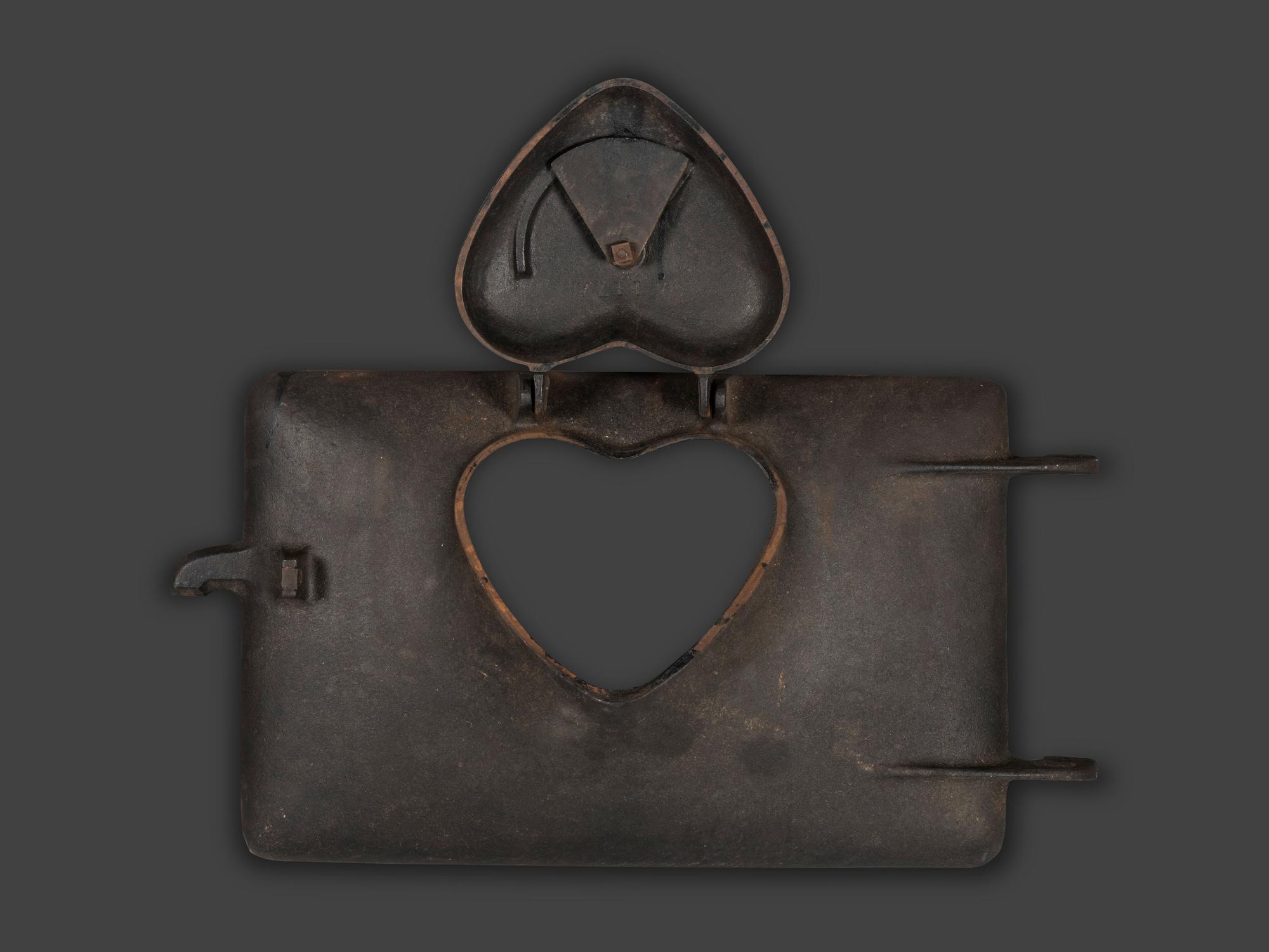 A 'Heart of the Home' Cast Iron Stove Door