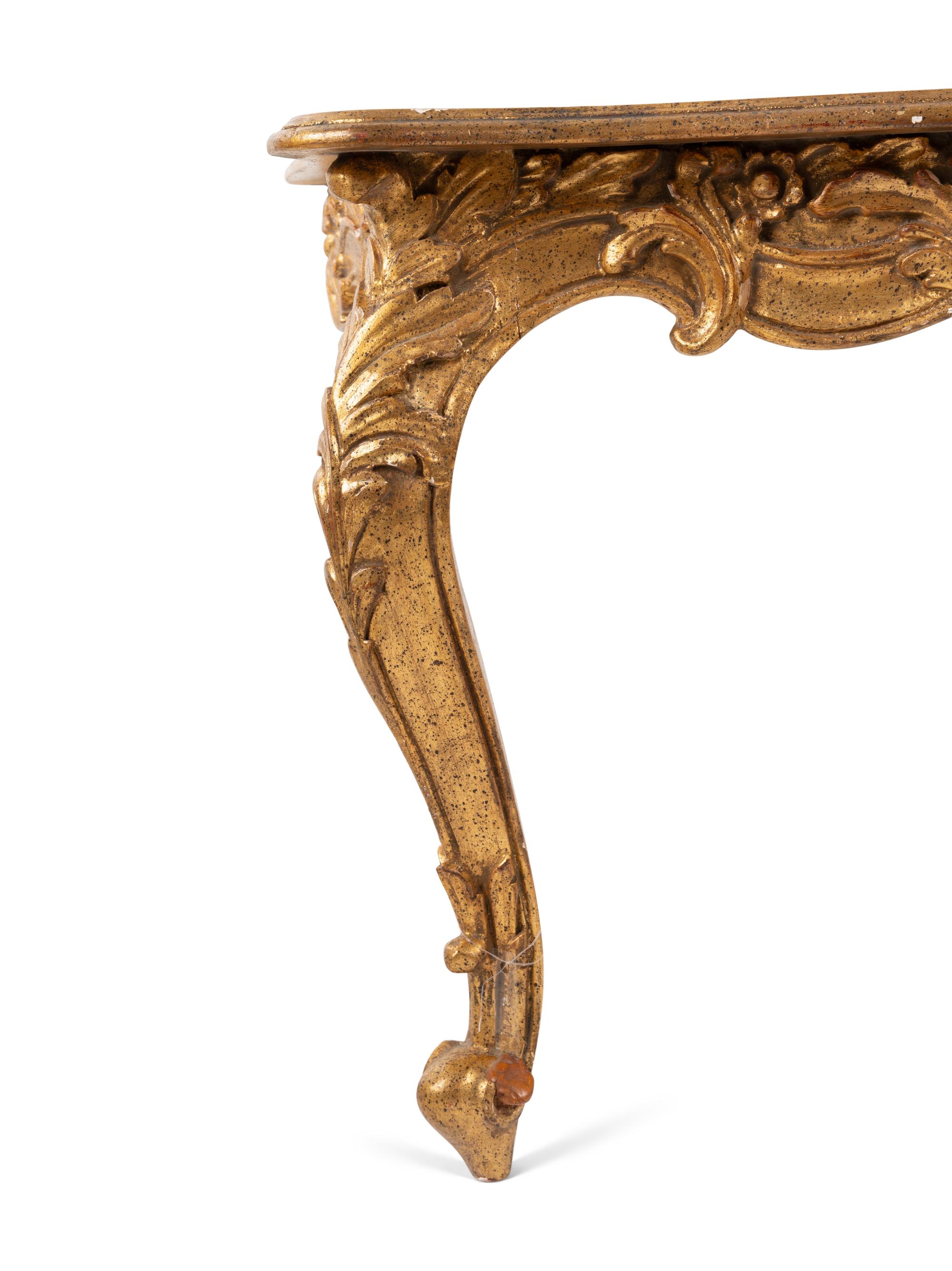 A Rococo Revival Giltwood Pier Mirror and Console Table