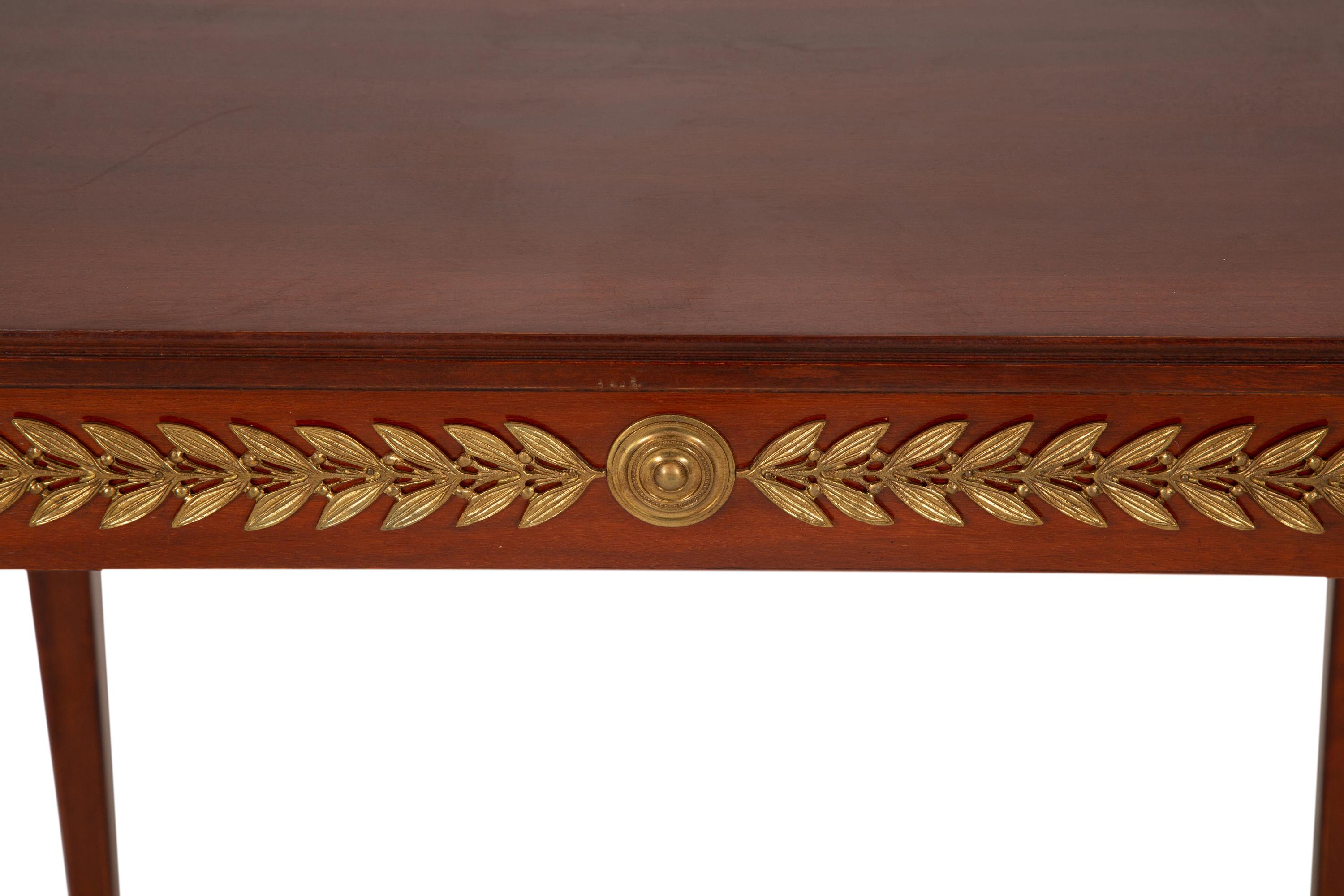A Pair of Empire Style Gilt Bronze Mounted Side Tables