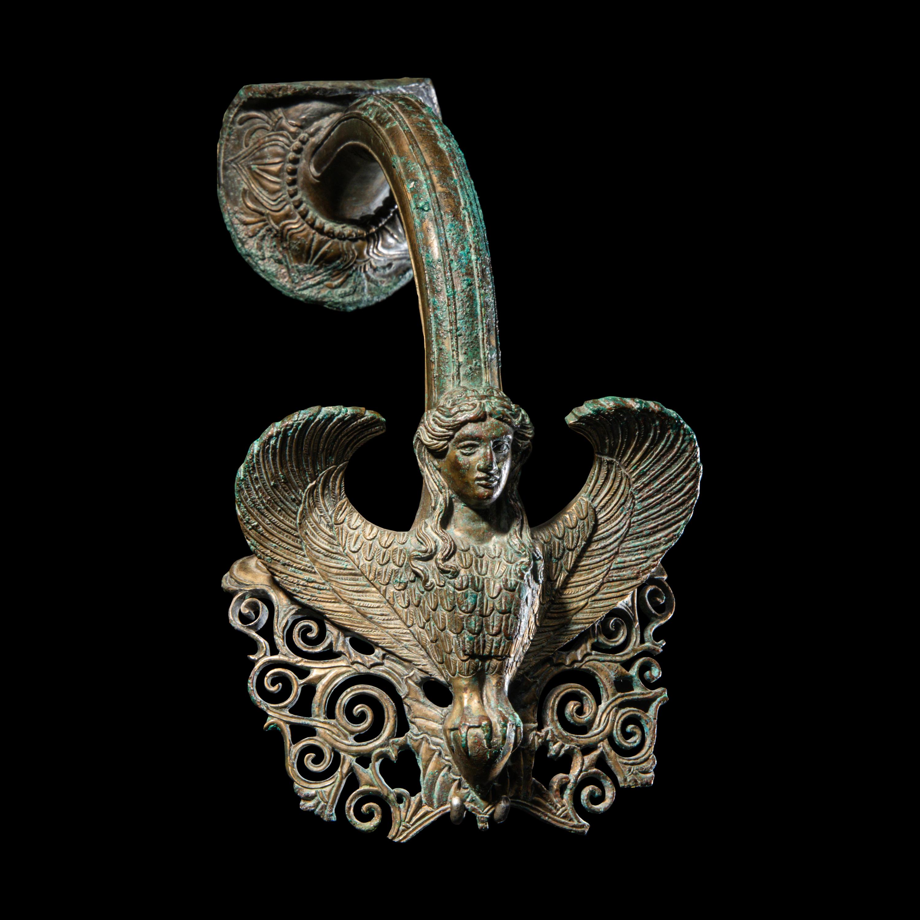 A Greek Bronze Hydria Handle with a Siren