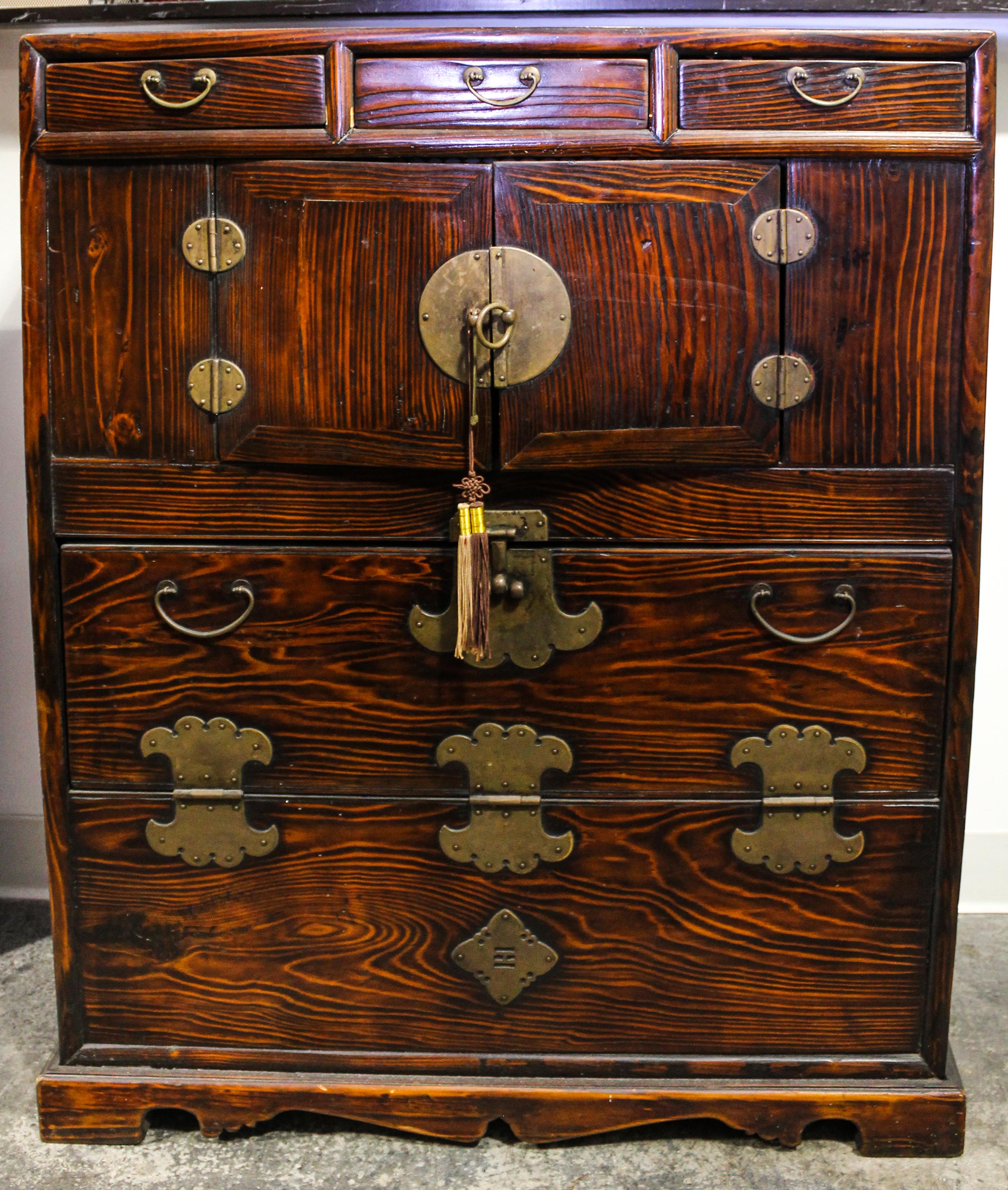 A Korean Metal Mounted Hardwood Chest Height 39 1/2 x width 32 x depth 15 1/4 inches.