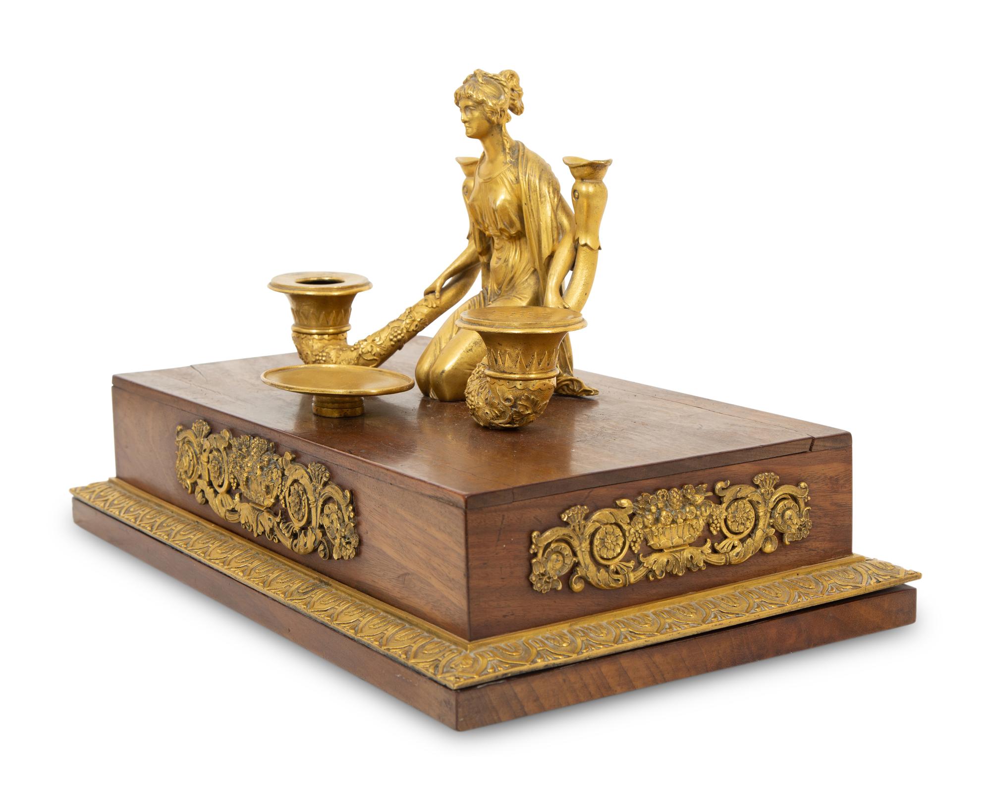 A Regency Gilt Bronze and Mahogany Ink Stand