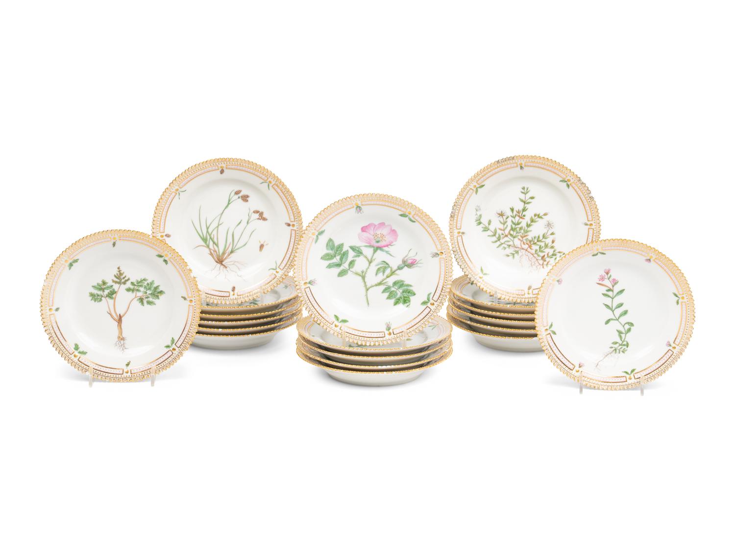 A Set of Nineteen Royal Copenhagen Flora Danica Porcelain Bread Plates