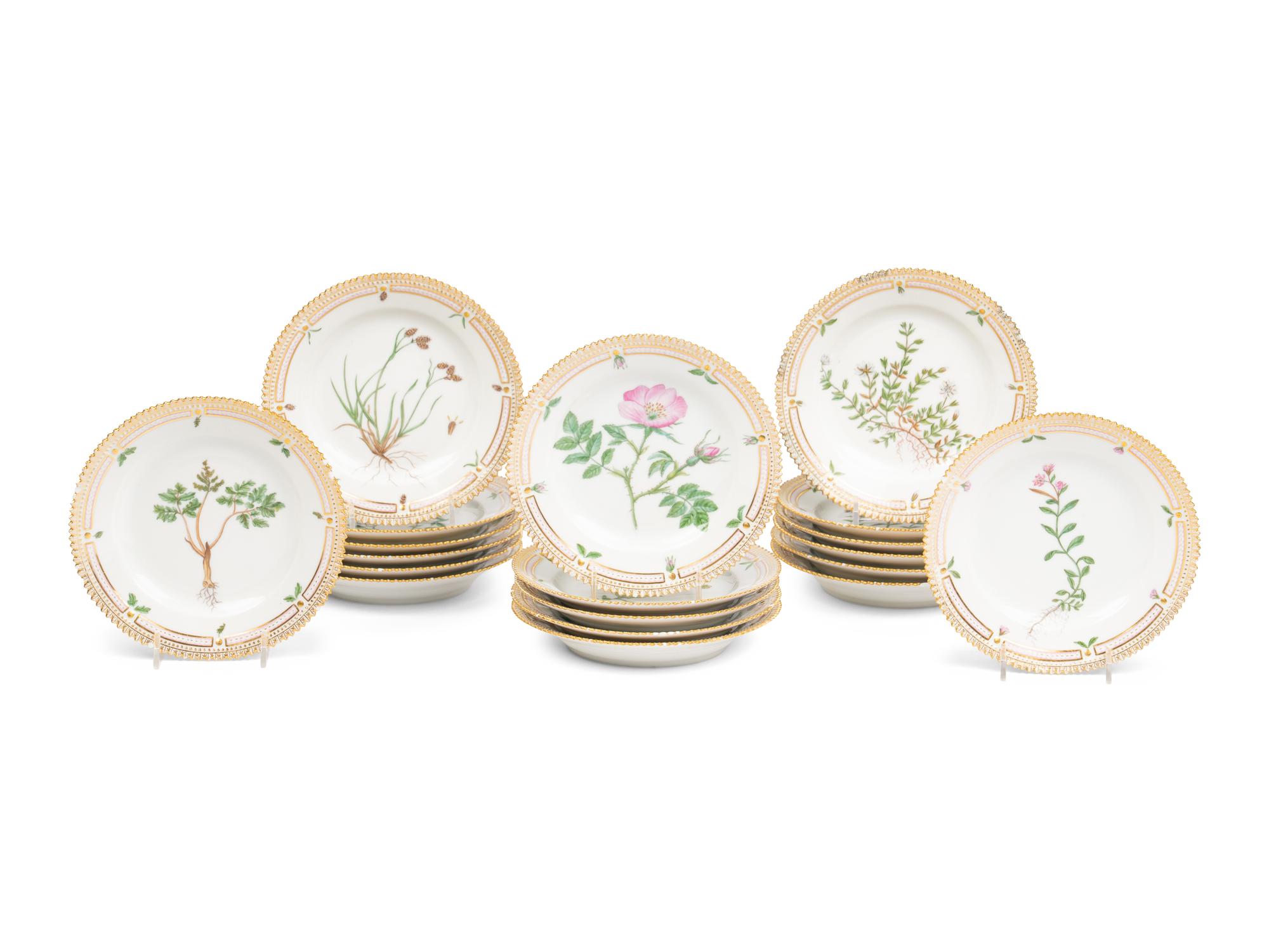 A Set of Nineteen Royal Copenhagen Flora Danica Porcelain Bread Plates