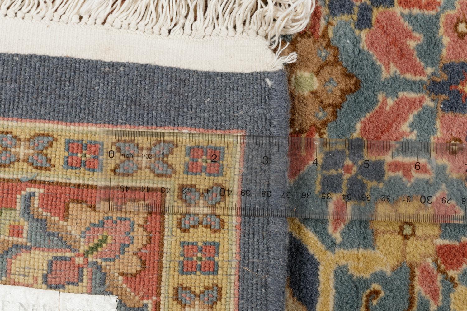 An Oushak Wool Rug