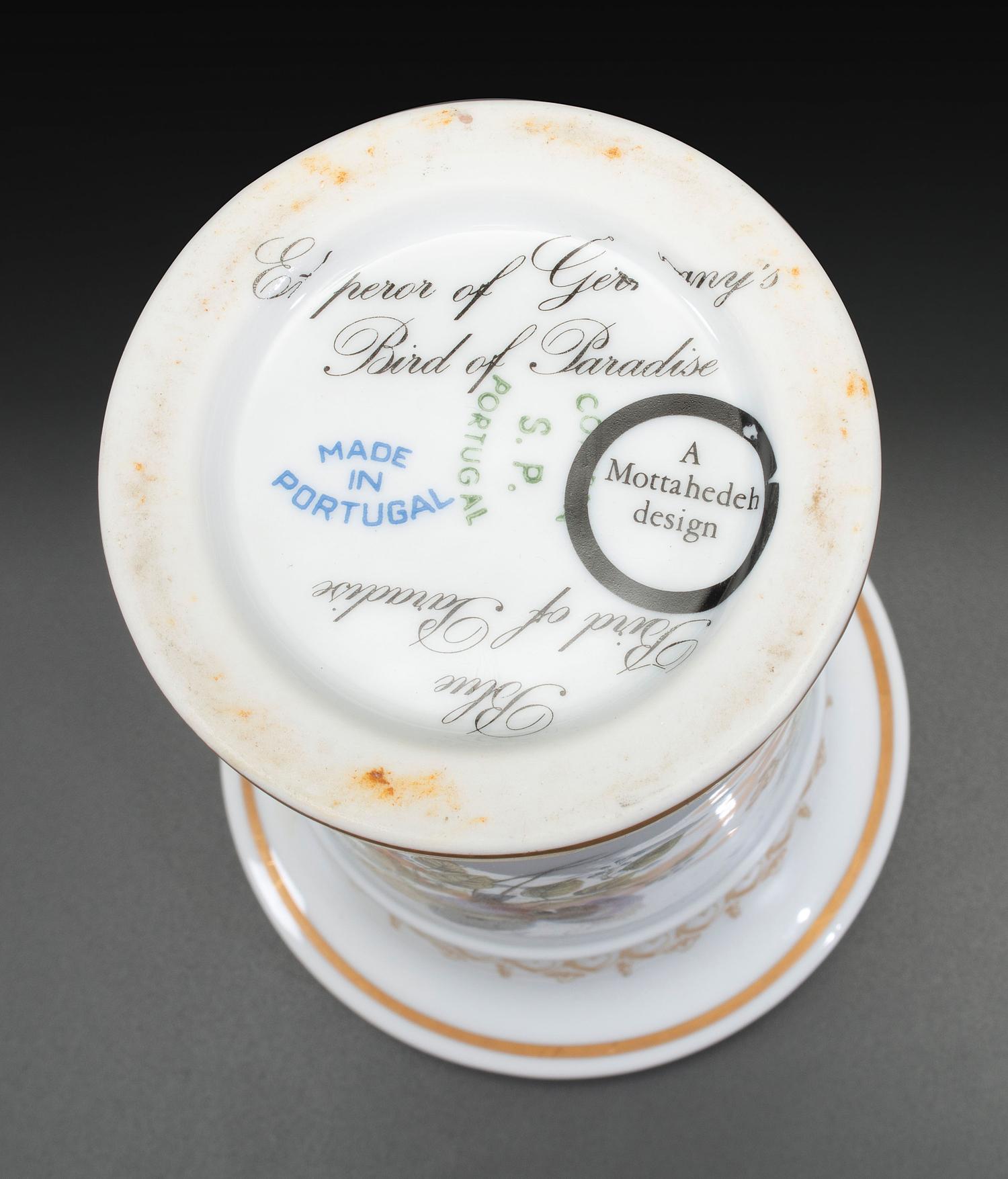 An English Parcel Gilt Bird and Insect Decorated Porcelain Partial Dinner Service