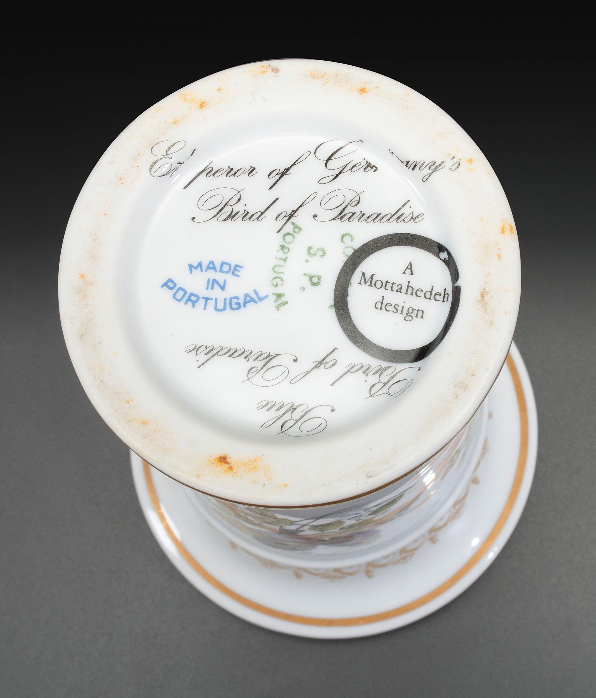 An English Parcel Gilt Bird and Insect Decorated Porcelain Partial Dinner Service