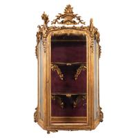 A Rococo Revival Carved Giltwood Hanging Collector's Cabinet