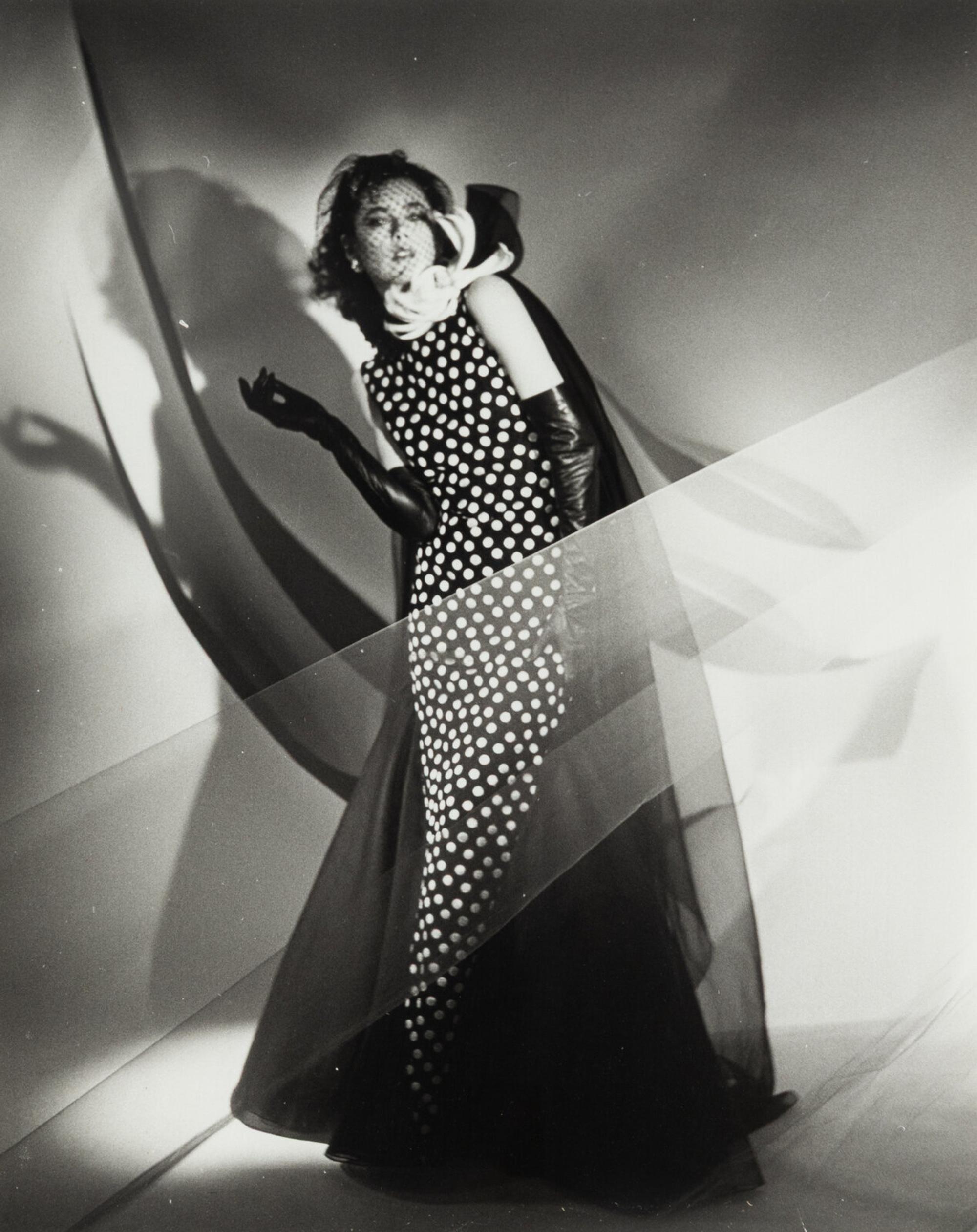 Four photographs depicting Dayle Haddon
