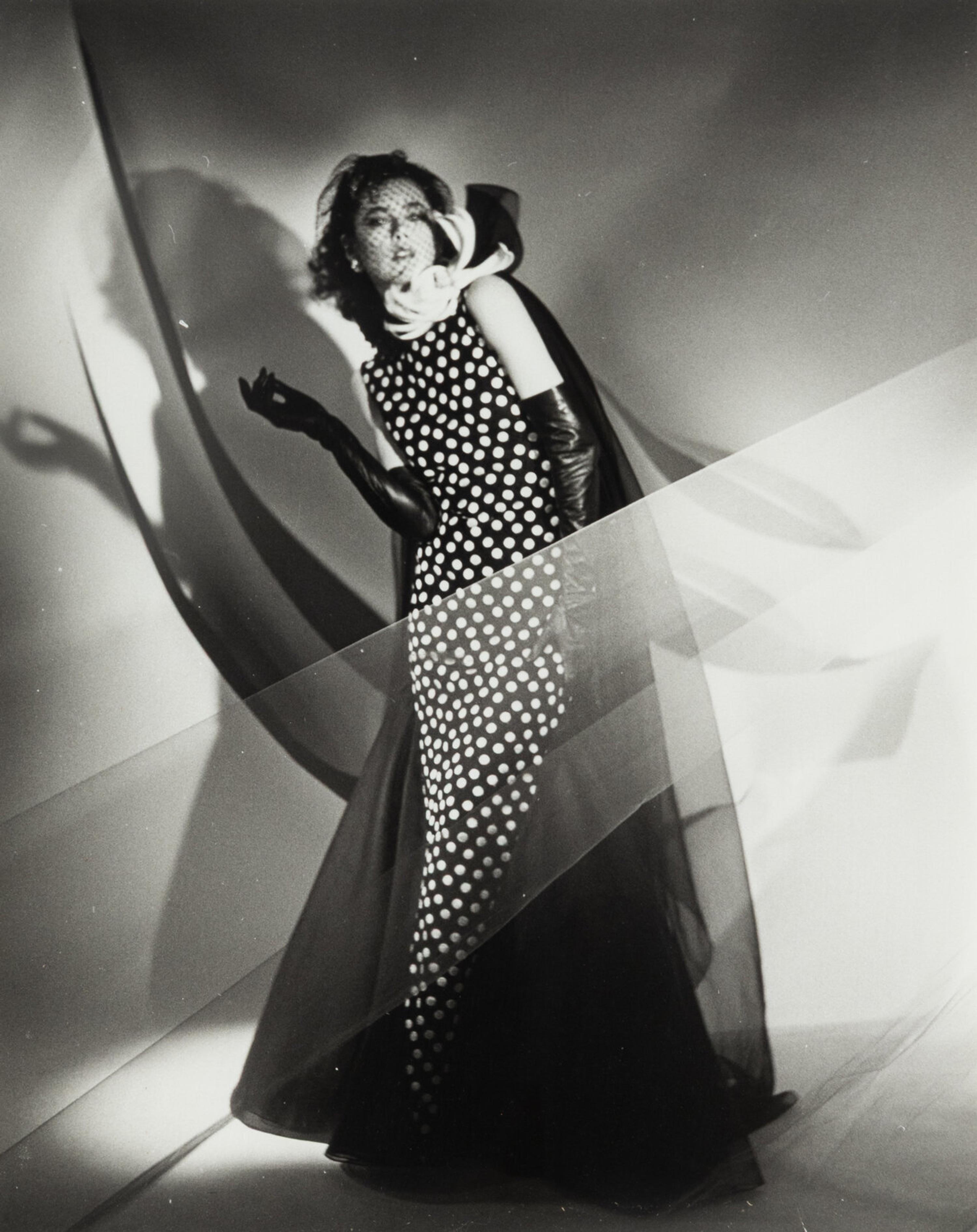 Four photographs depicting Dayle Haddon