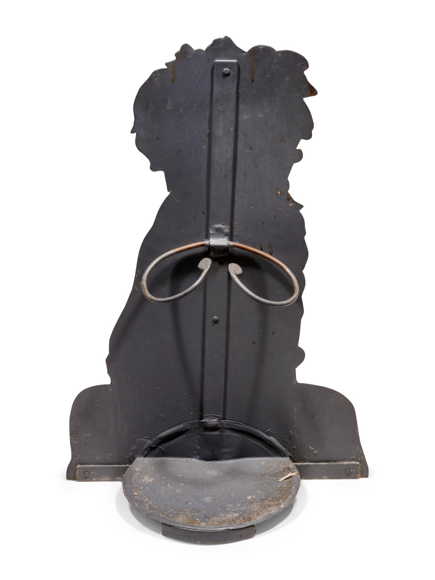 A Tole Dummy Board Depicting a Seated Dog