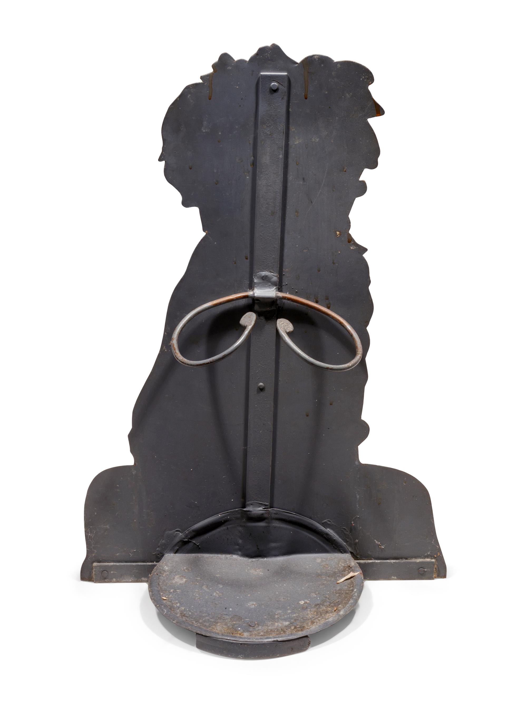 A Tole Dummy Board Depicting a Seated Dog