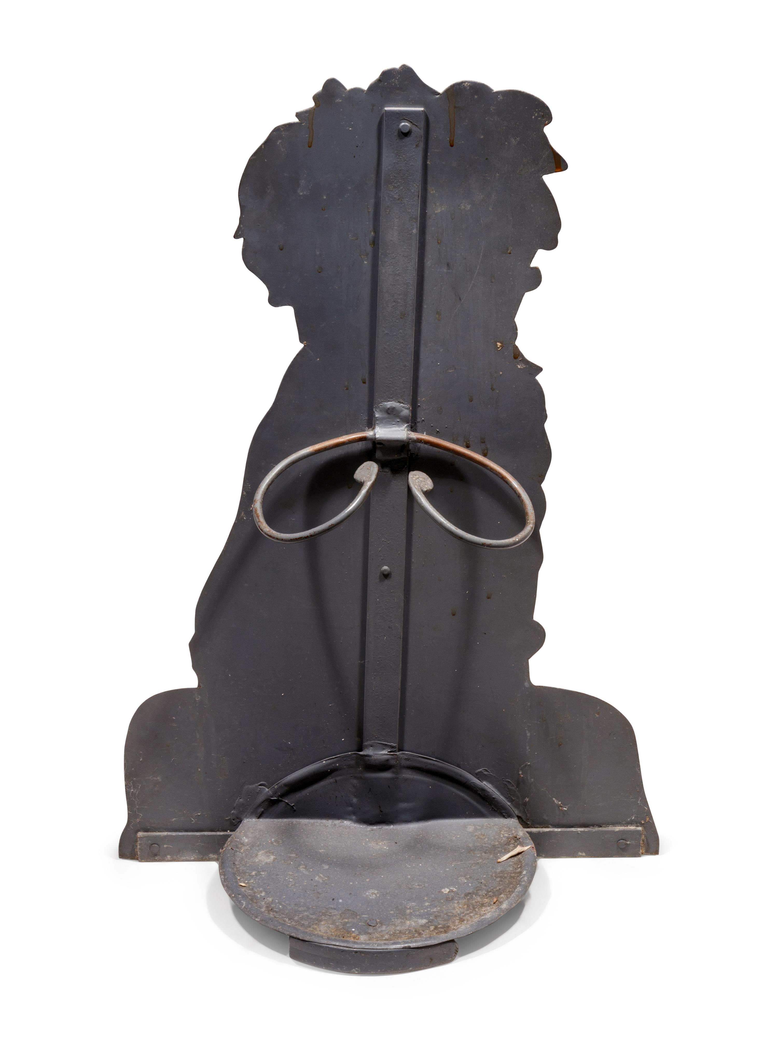 A Tole Dummy Board Depicting a Seated Dog