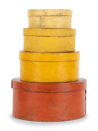 A Set of Four Graduated Shaker Boxes