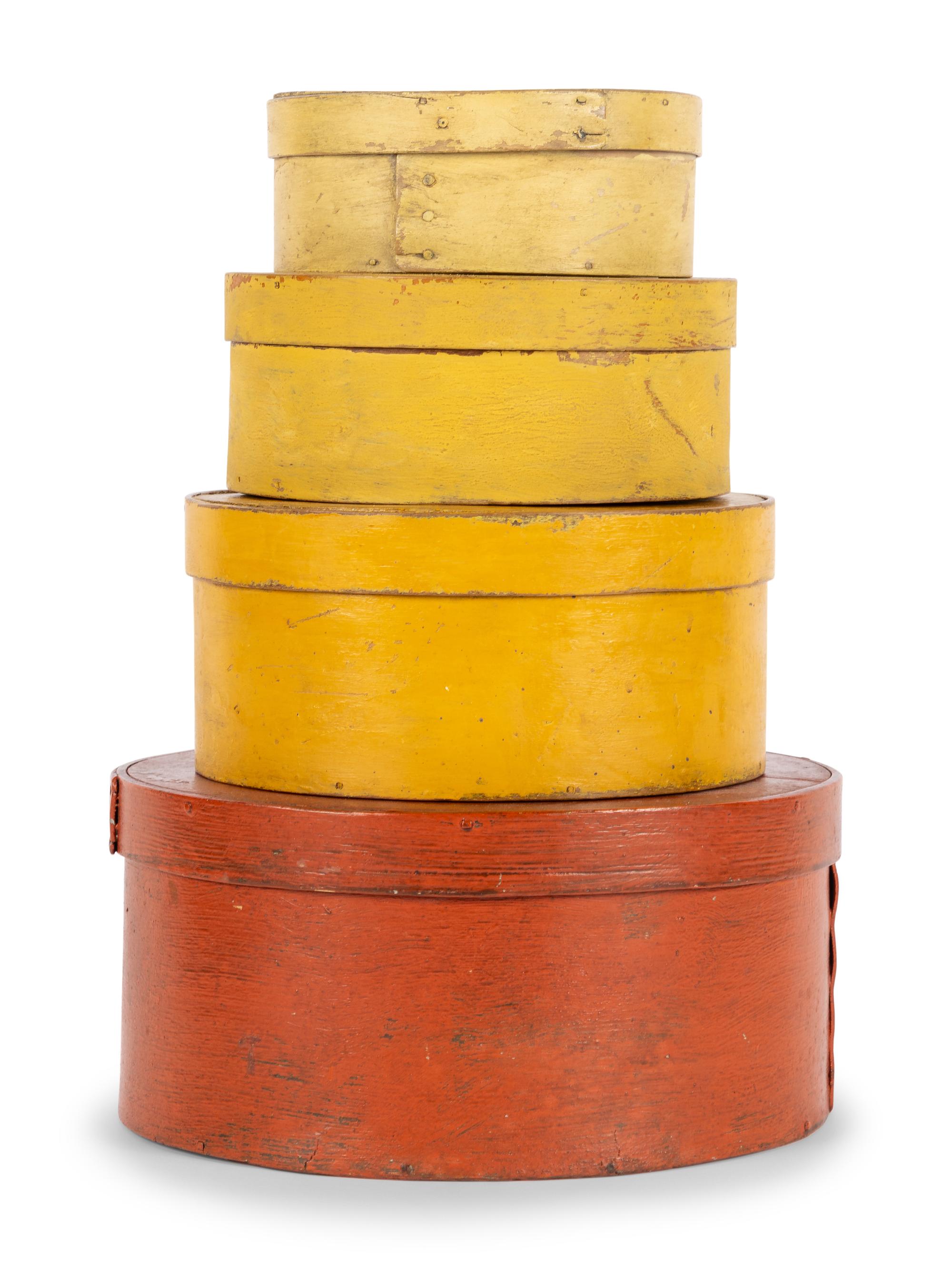 A Set of Four Graduated Shaker Boxes