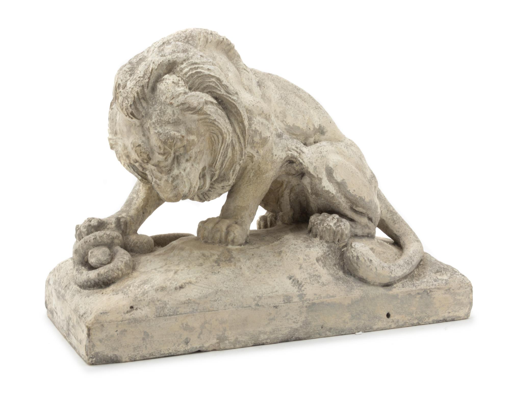 A Cast Stone Figure of a Lion Height 11 3/4 x width 15 3/8 x depth 7 5/8 inches. — AFTER ANTOINE-LOUIS BARYE, 20TH CENTURY