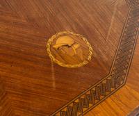 An Italian Carved Walnut and Marquetry Table