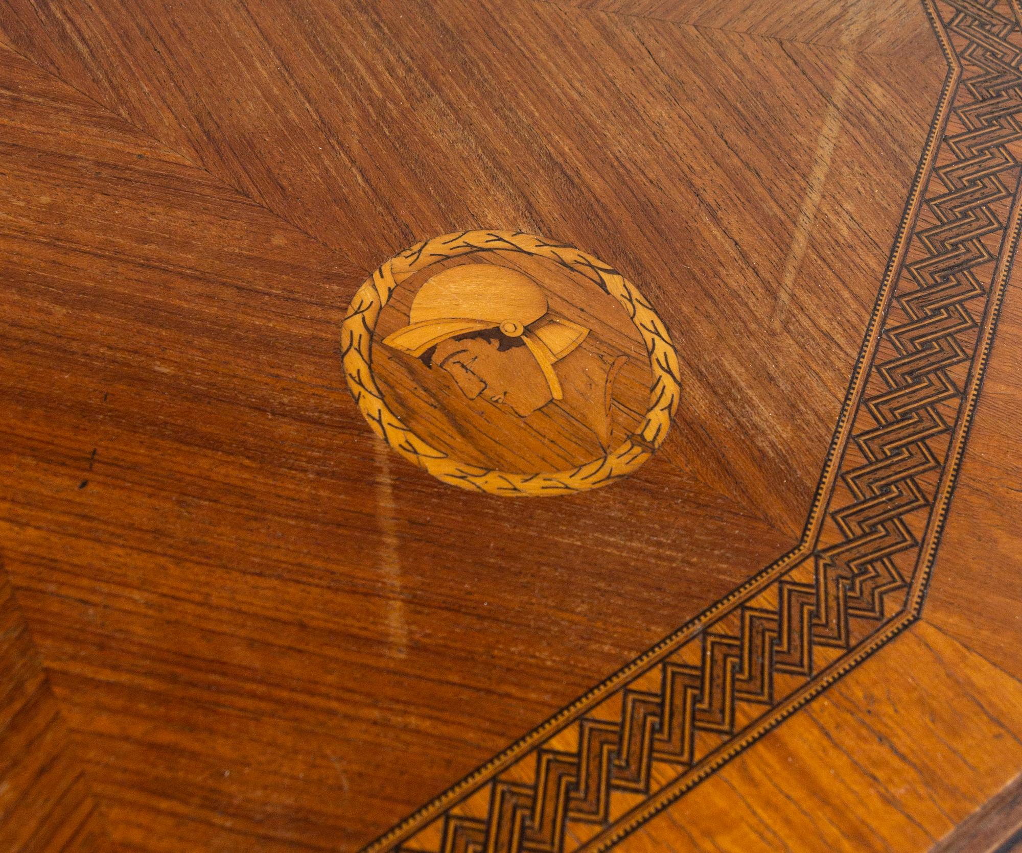An Italian Carved Walnut and Marquetry Table