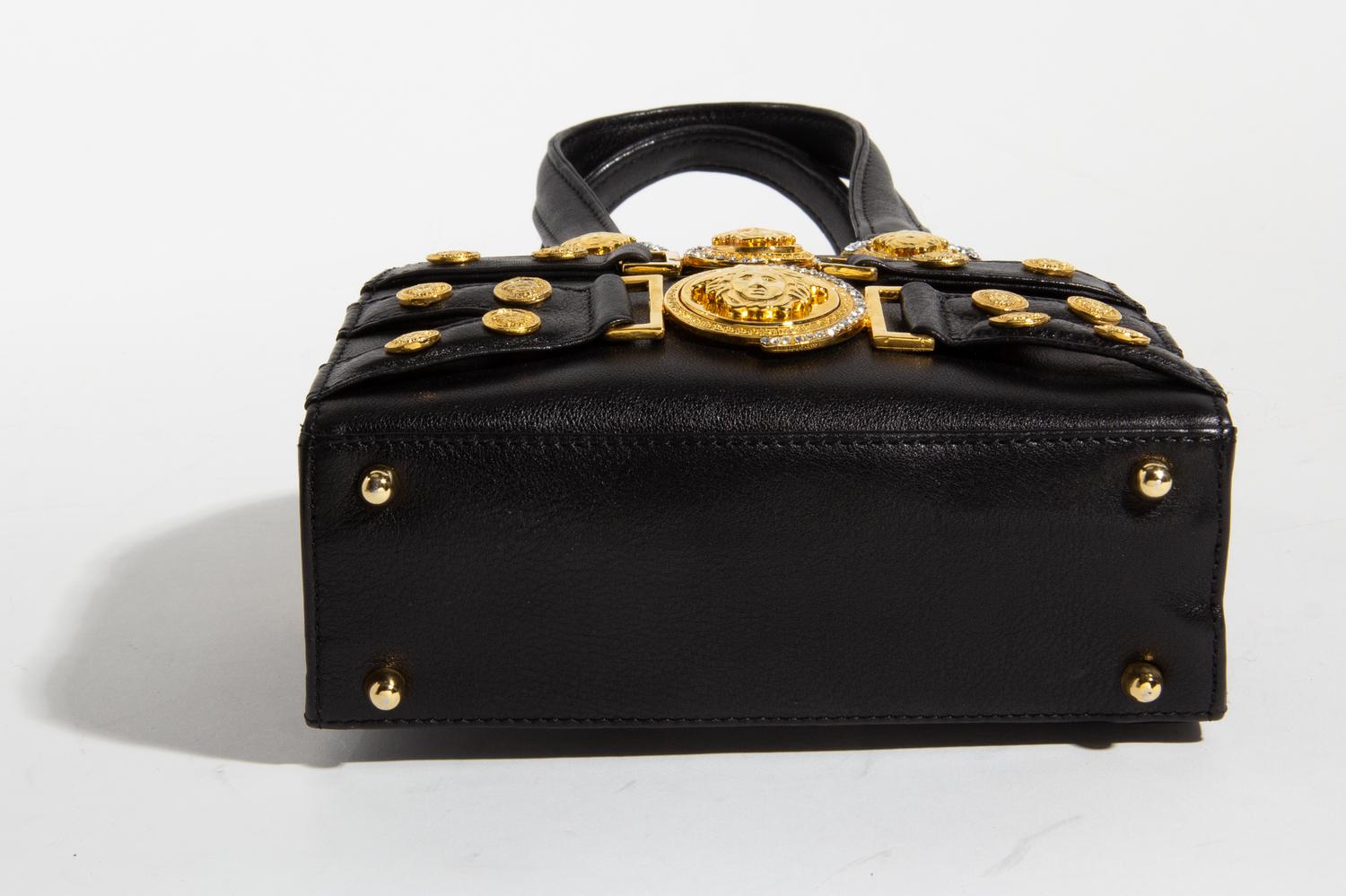 A Gianni Versace Black Mini Medusa Bag, 6" x 6.75" x 2.75"; Handle drop: 4".