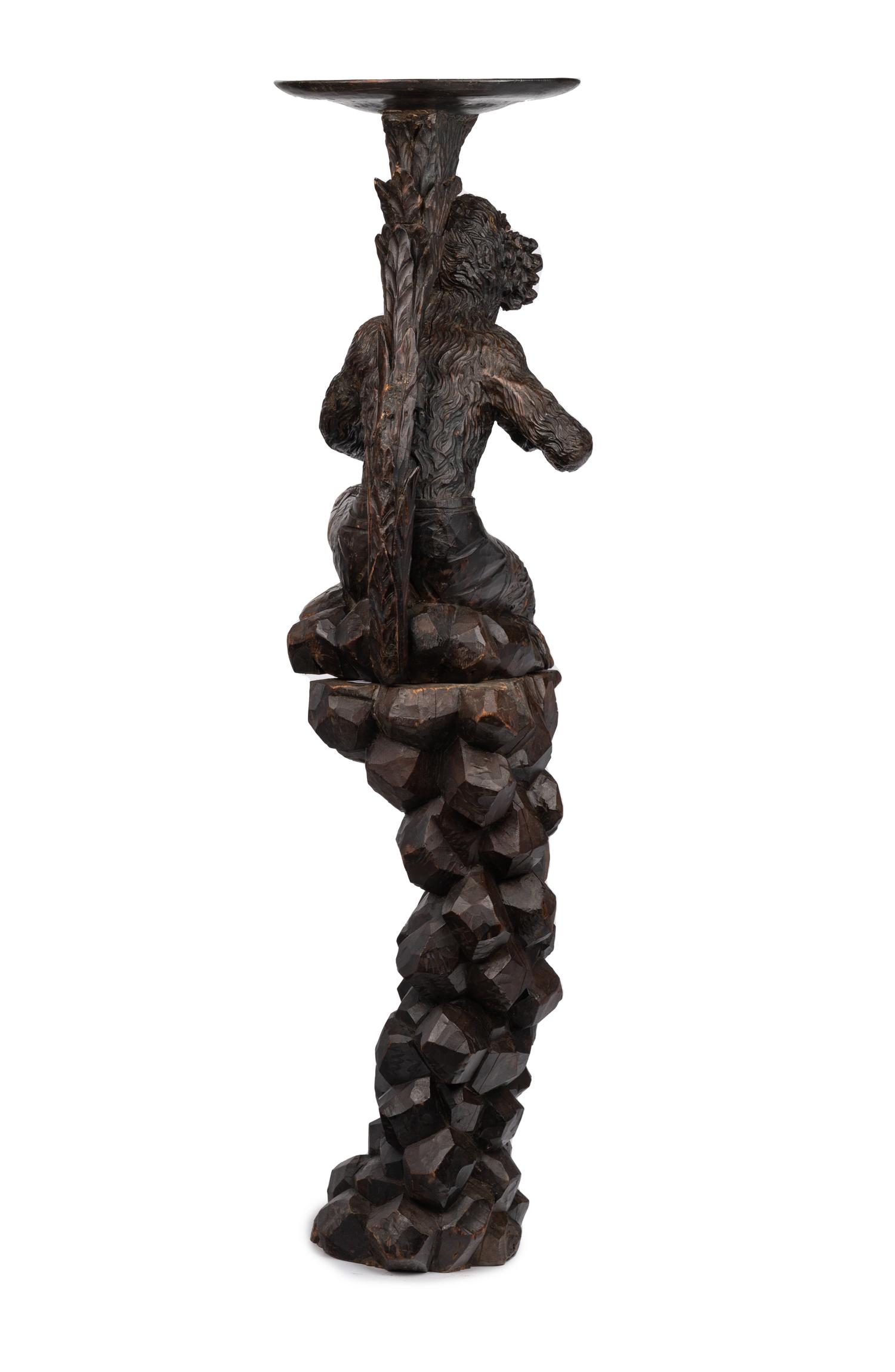 A Venetian Style Carved Walnut Figural Pedestal