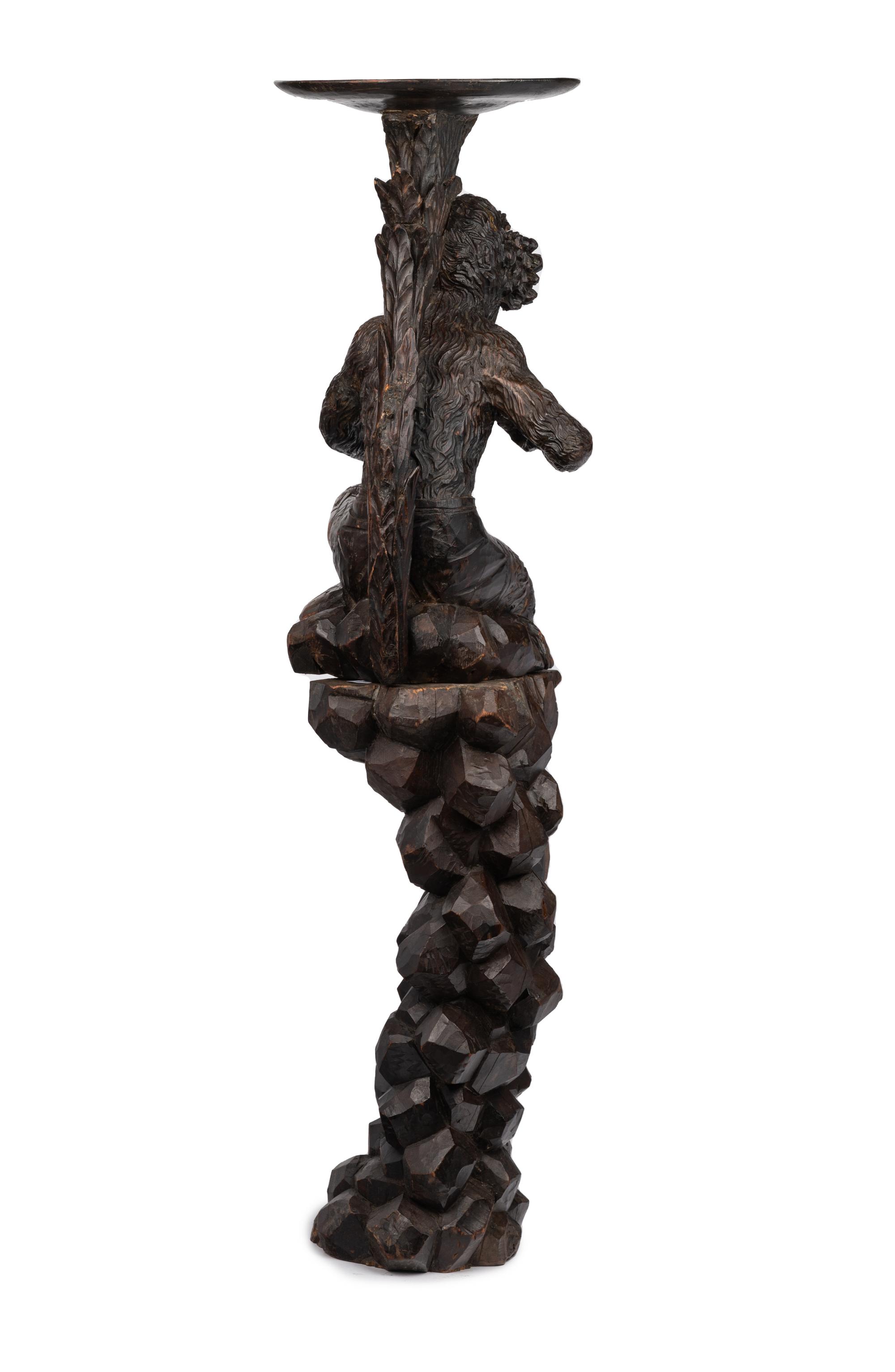 A Venetian Style Carved Walnut Figural Pedestal