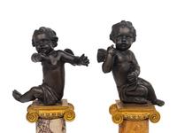 A Near Pair of French Bronze Putti on Gilt Bronze Mounted Marble Columns