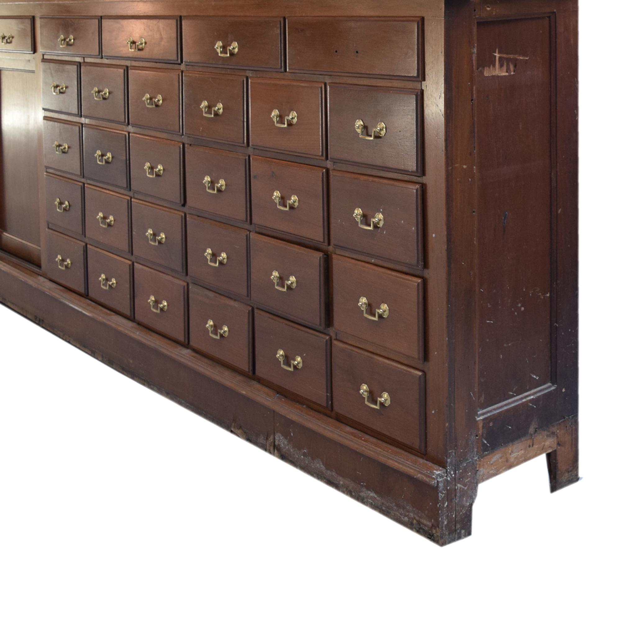 A Two-Tier Mahogany Pharmacy Cabinet 165" W x 15" D x 95" H — United States, 20th Century