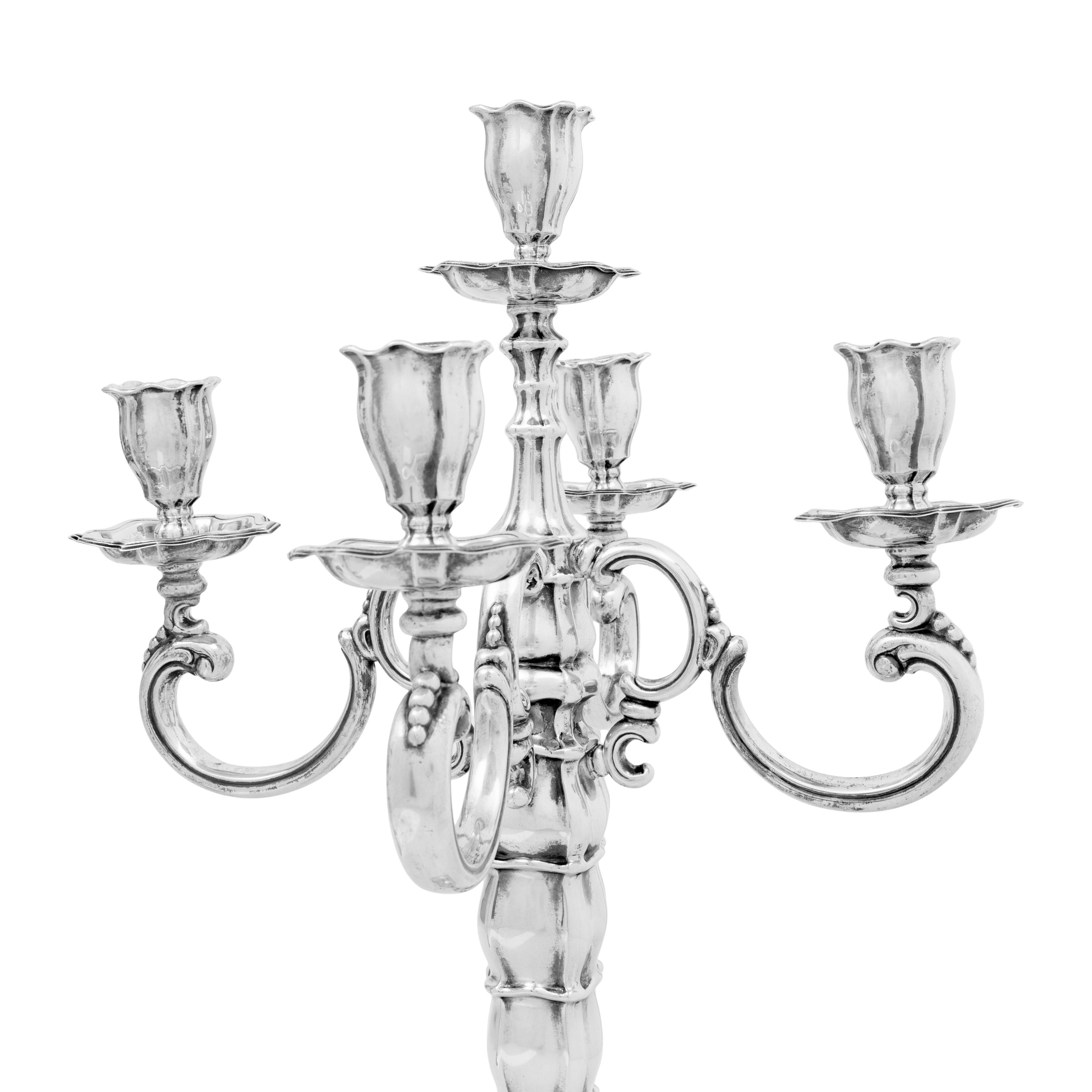 A Pair of German Silver Five-Light Candelabra