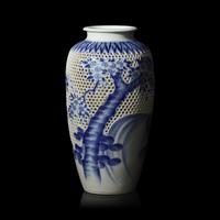 A Japanese Hirado Blue and White Porcelain Reticulated Double-Walled 'Koi and Flowers' Vase, Meiji/Taisho Period 日本明治/大正時期 平戶燒青花鯉魚圖賞瓶