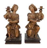 A Pair of Continental Giltwood Figural Altar Candlesticks