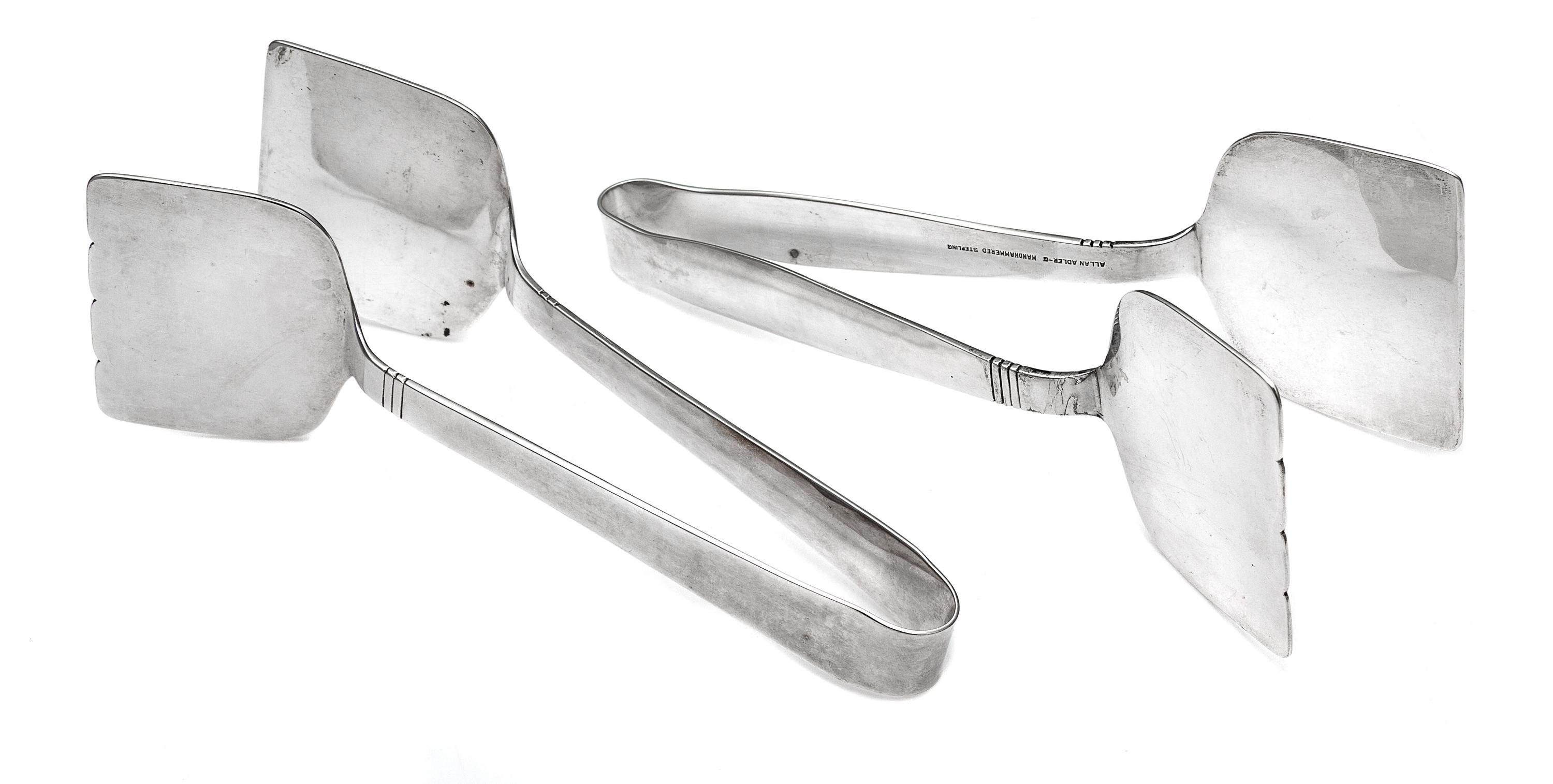 A Pair of American Silver Sandwich Tongs, Alan Adler, Los Angeles, CA, 20th Century, each having a spot-hammered finish with banded dec