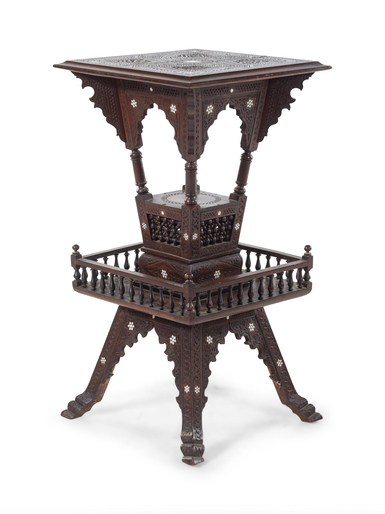 A Walnut Pedestal Table
