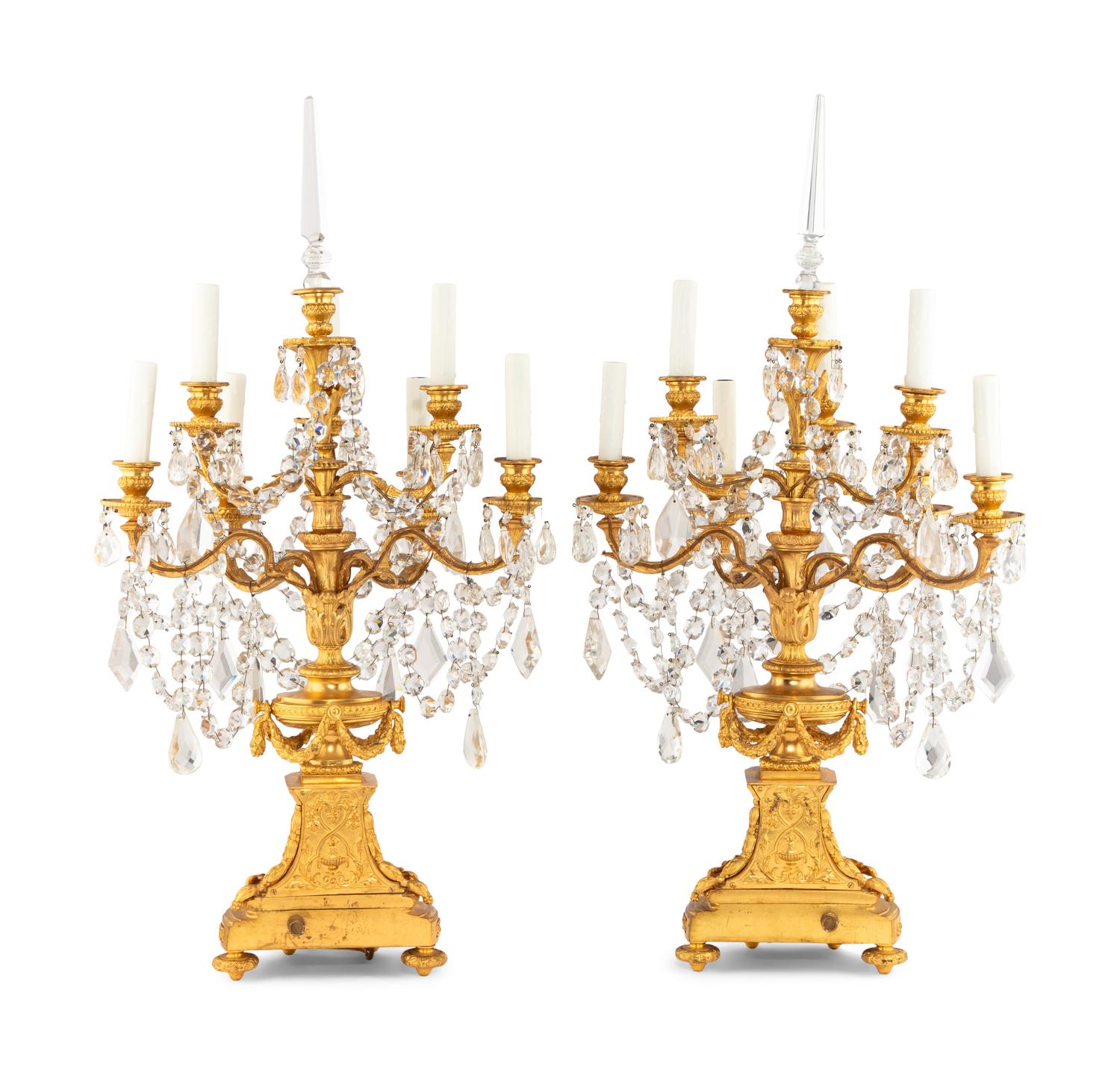 A Pair of French Gilt Bronze and Cut Glass Seven-Light Candelabra