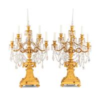 A Pair of French Gilt Bronze and Cut Glass Seven-Light Candelabra