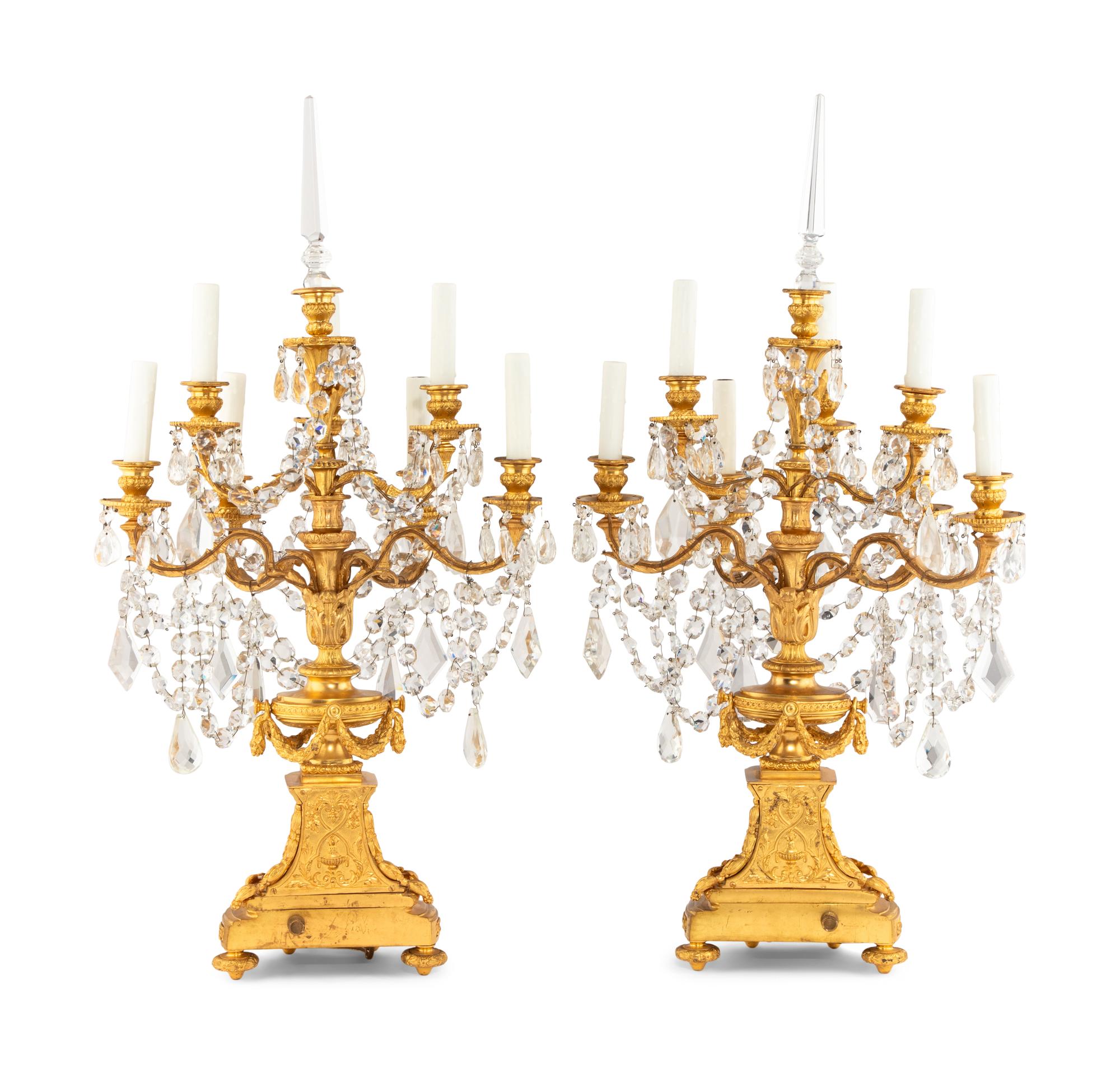A Pair of French Gilt Bronze and Cut Glass Seven-Light Candelabra