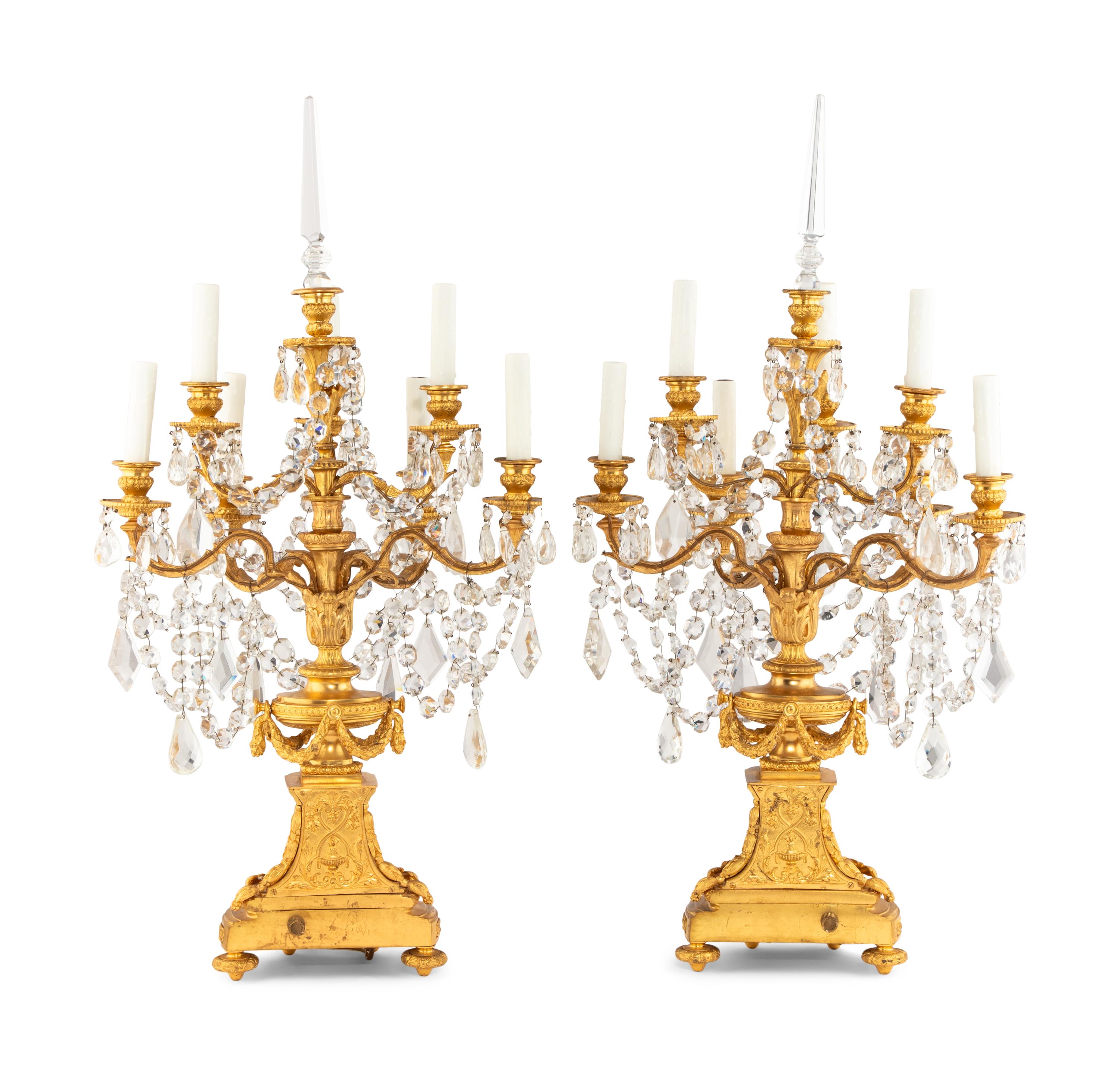 A Pair of French Gilt Bronze and Cut Glass Seven-Light Candelabra