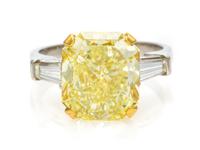 A Platinum, Yellow Gold, Fancy Yellow Diamond and Diamond Ring, Graff, 4.40 dwts.