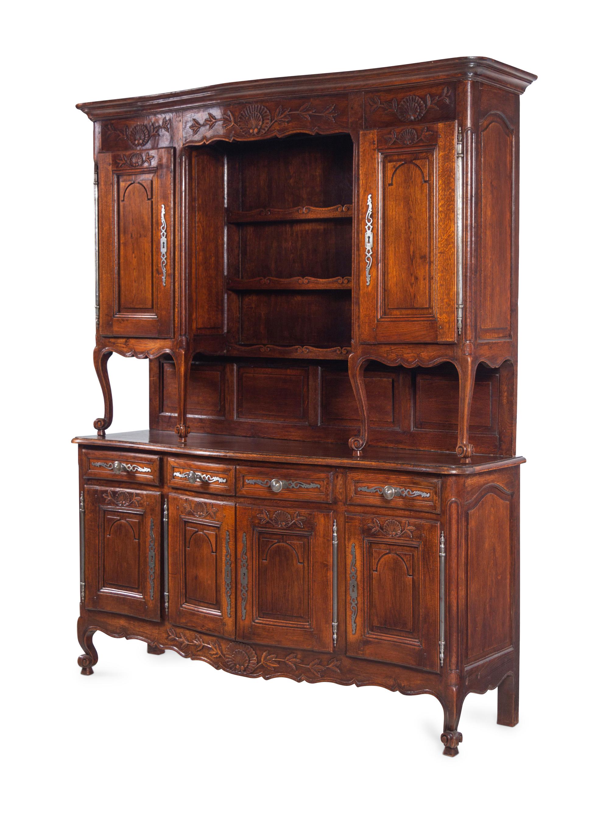 A Louis XV Provincial Carved Walnut Buffet à Deux Corps