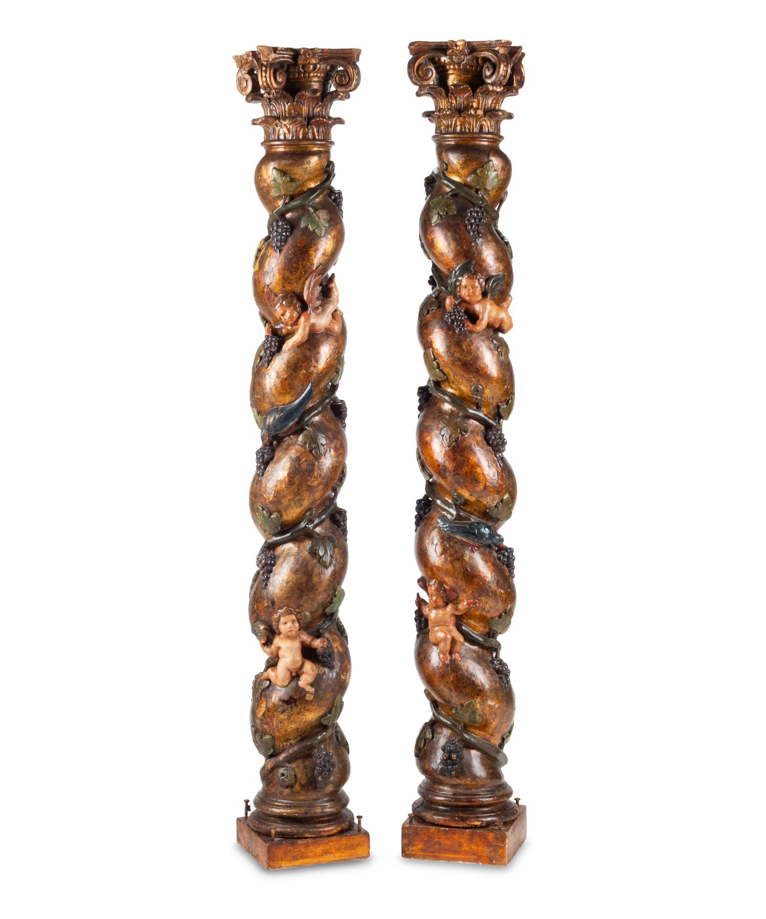 A Pair of Spanish Carved and Polychrome Decorated Solomonic Columns