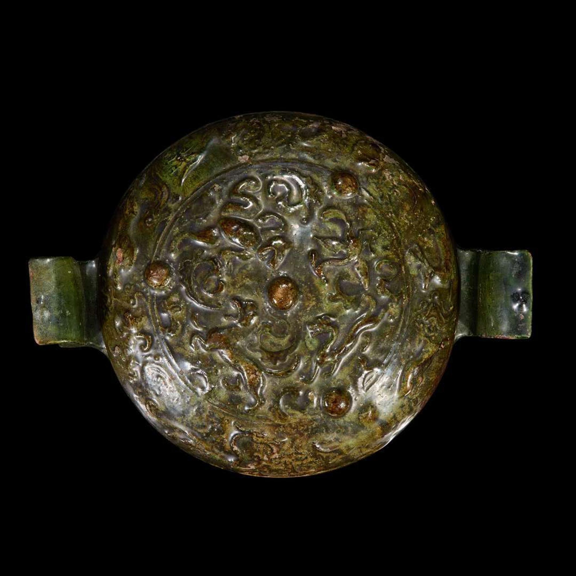 A Chinese green-glazed red pottery tripod vessel and cover, Ding Han dynasty