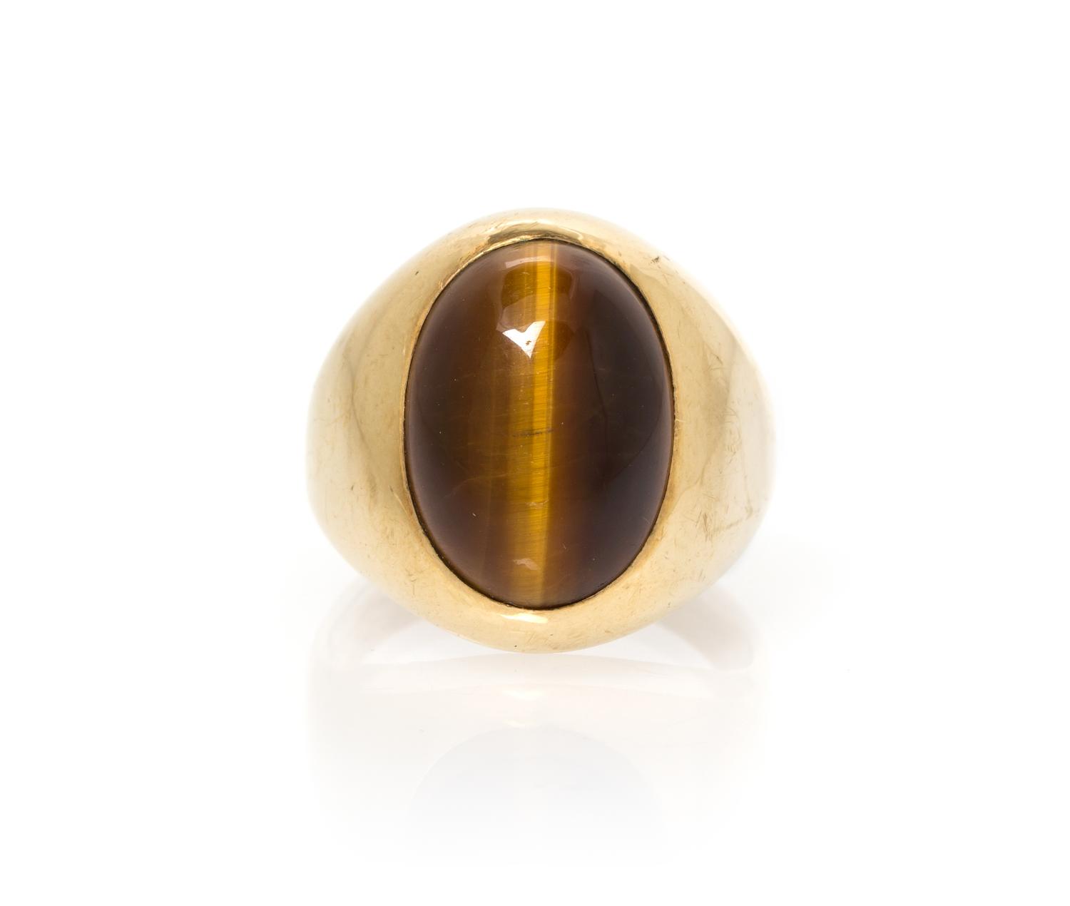 A Yellow Gold and Tiger's-Eye Ring, 6.40 dwts.