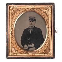 [CIVIL WAR]. A group of 2 cased images, incl. sixth plate tintype of Jos. Banks, 3rd New York Artillery. Washington, DC: Bell & Bro., 1860s.