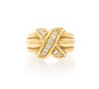 An 18 Karat Yellow Gold and Diamond X Ring, Tiffany & Co., Circa 1990, 8.30 dwts.