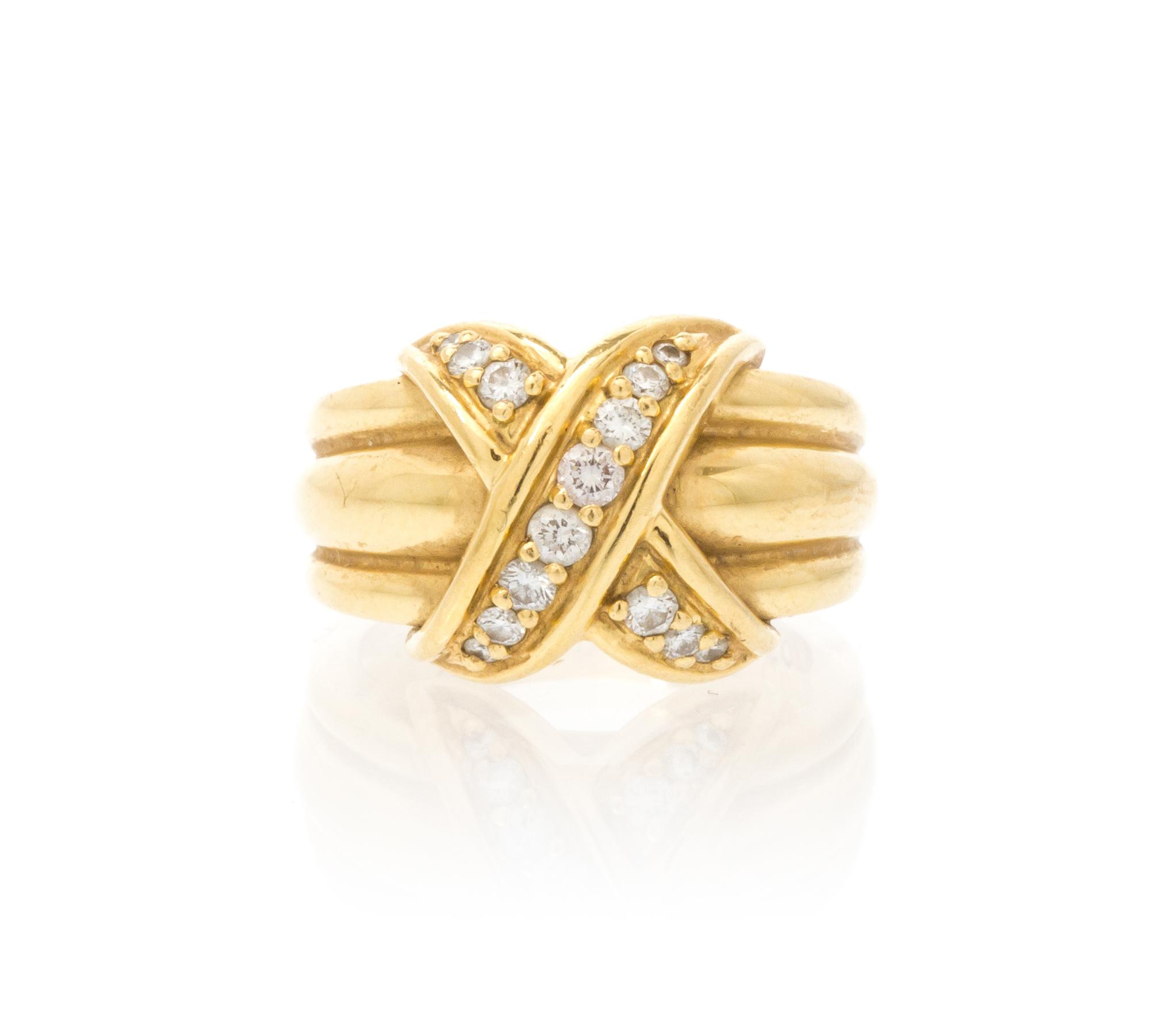 An 18 Karat Yellow Gold and Diamond X Ring, Tiffany & Co., Circa 1990, 8.30 dwts.