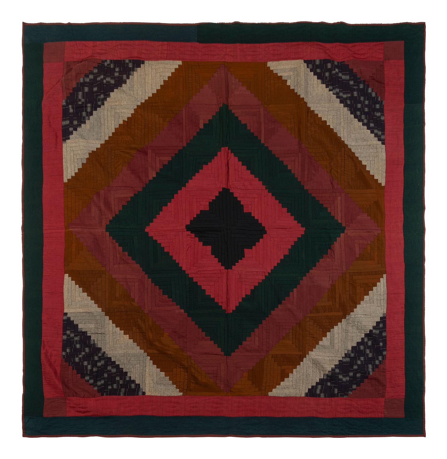 An Amish Wool 'Log Cabin -Barn Raising' Pattern Quilt